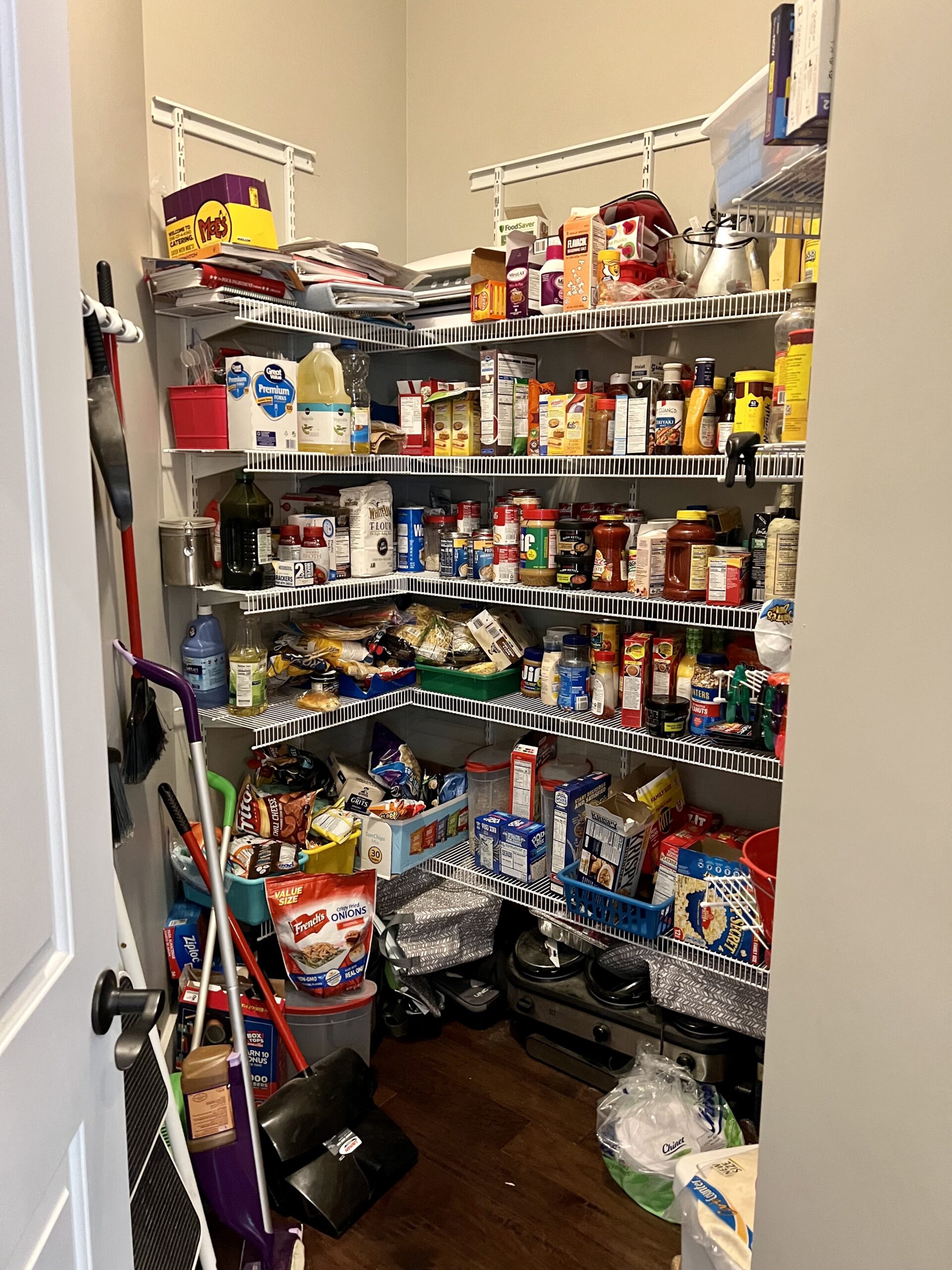 Organized pantry corner shelving with breakfast cereals and pantry staples by Imagine Organizing — Home Organizing in Avondale Estates